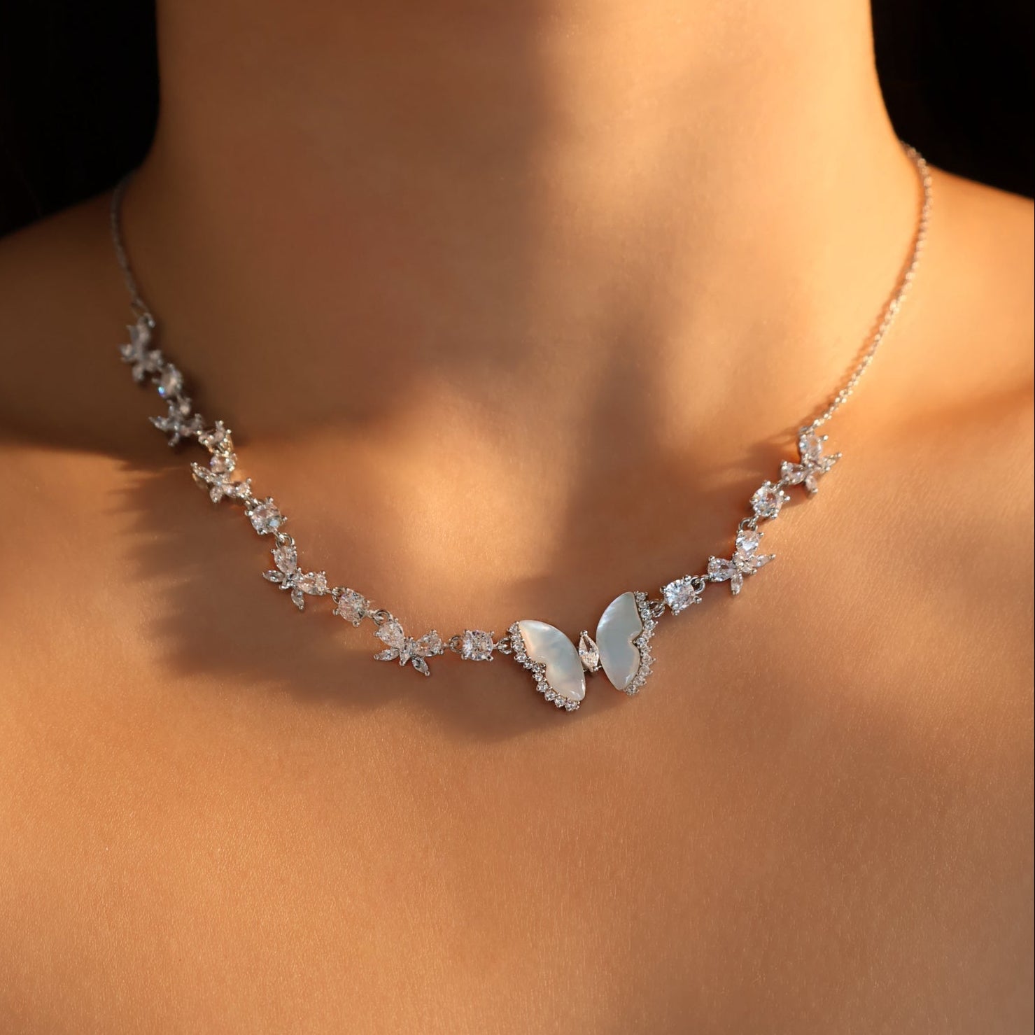 Elara Butterfly Diamanté Necklace (gold & silver)